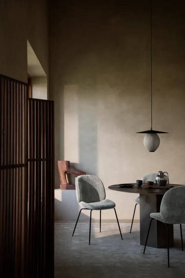 Beetle upholstered dining chair