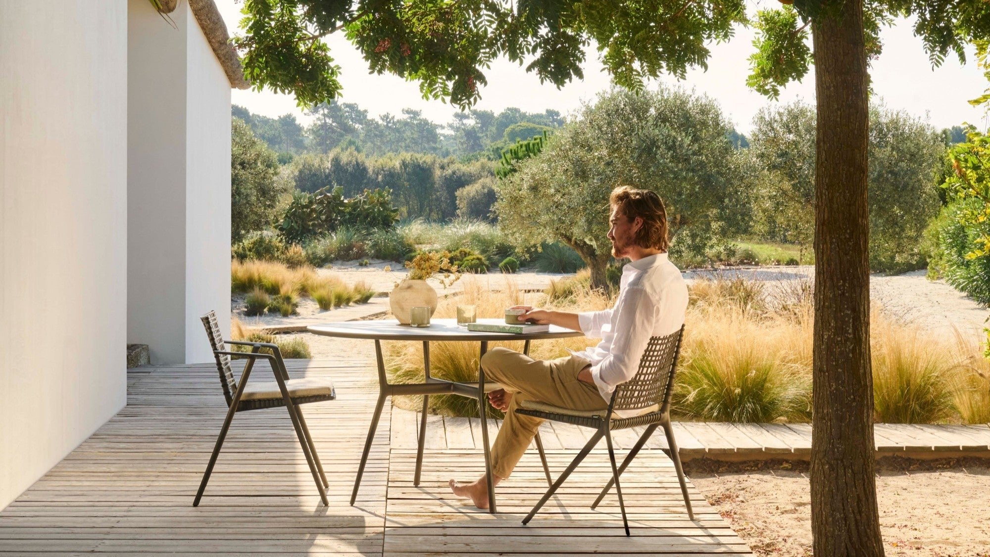 Branch outdoor dining chair with arms