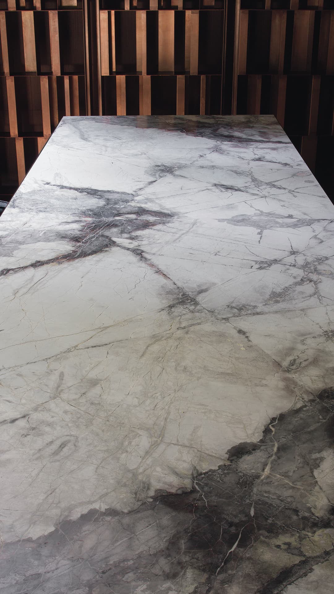 Stealth dining table with wooden surface